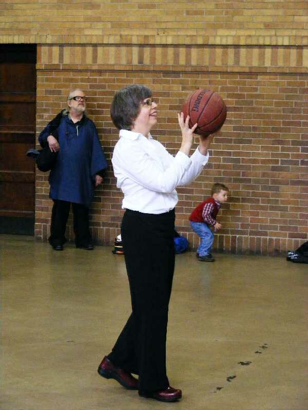 DSCF5709B Pastor Sherrie Lowly was among the shooters at the Berry UMC Nothing But Nets fundraiser Sunday after services.